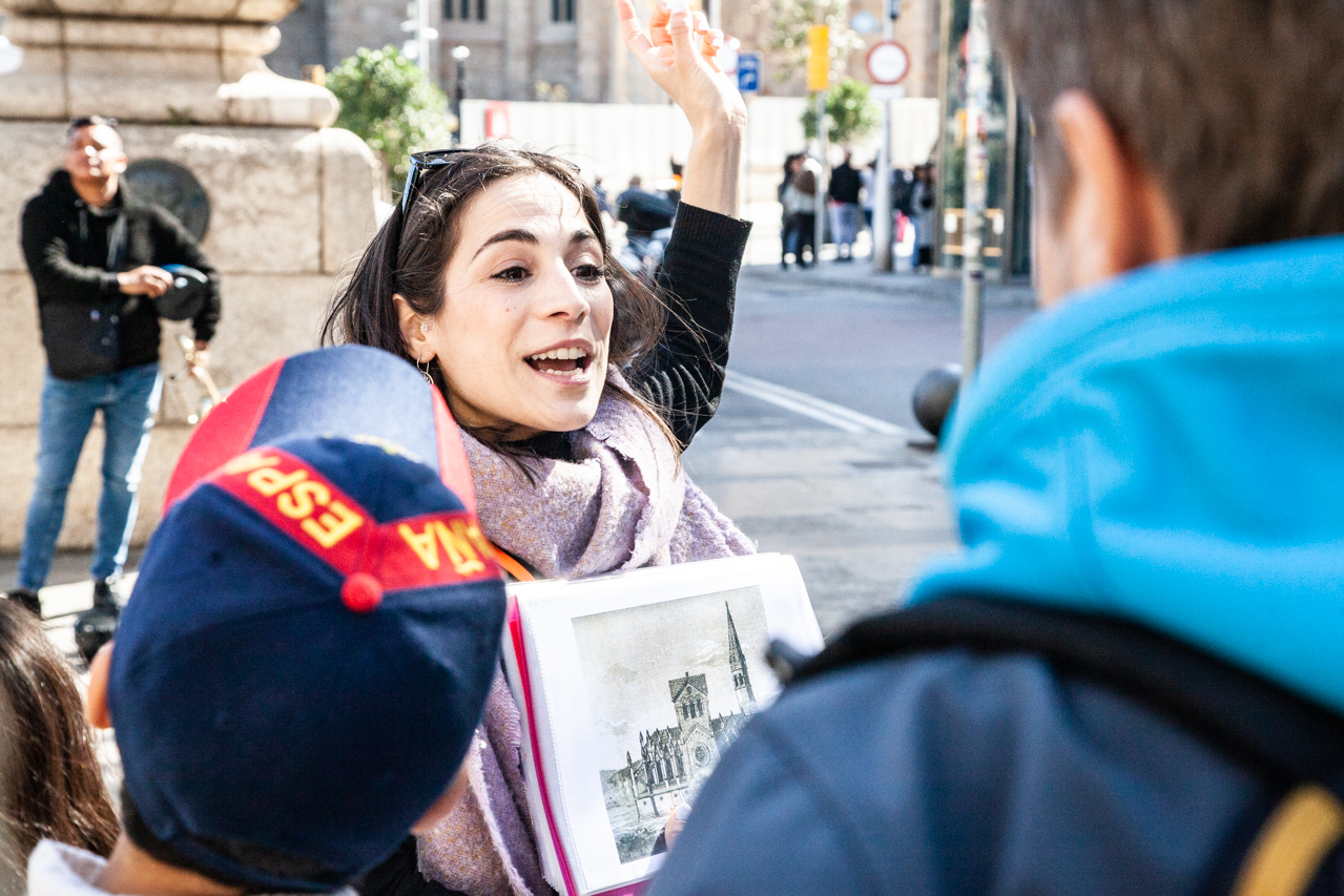 Barcelona tour guide explaining local architecture