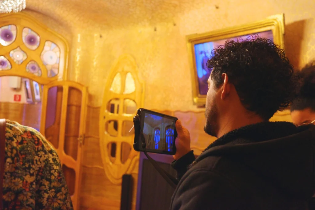 Guest using virtual reality guide in Casa Battlo Insider Tour